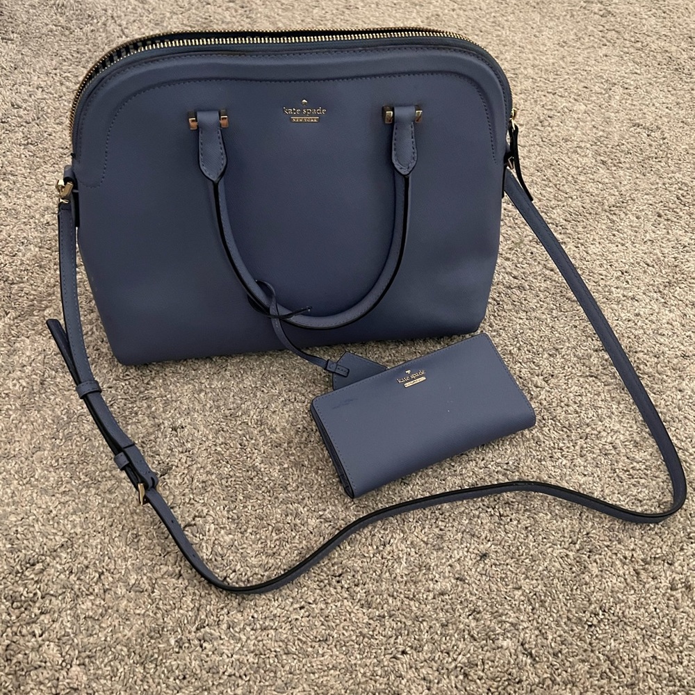 Kate spade periwinkle purse and matching wallet.
